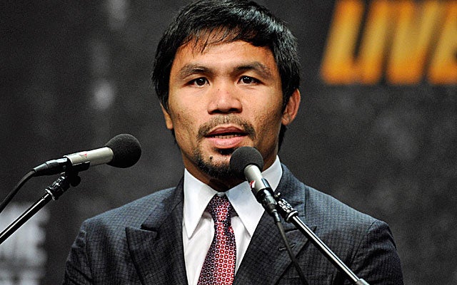 Leg cramps appear to be hounding Manny Pacquiao at a pretty inopportune time.  (USATSI)