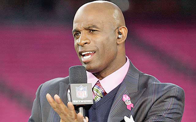 Whoa, whoa, whoa, Deion Sanders is dropping some fatherly advice on Twitter. (Getty Images)
