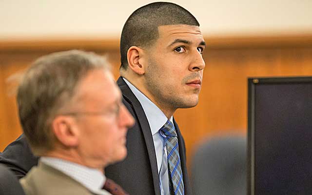 Aaron Hernandez is facing murder and weapons charges in the slaying of Odin Lloyd.  (Getty Images)