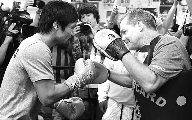 Al Bernstein says Manny Pacquiao needs to throw 800 punches to beat Mayweather. (Getty Images)