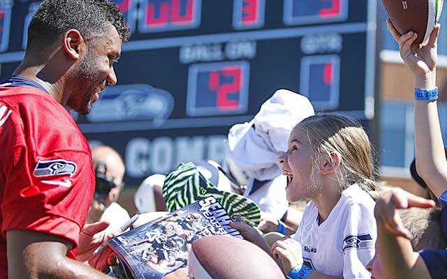 Russell Wilson loves connecting with his young fans. (USATSI)