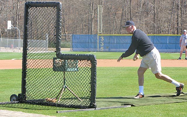 Despite three elbow surgeries and nagging pain, Coach Hendley still pitches BP at Stratford alumni festivities.    (Provided to CBSSports.com)